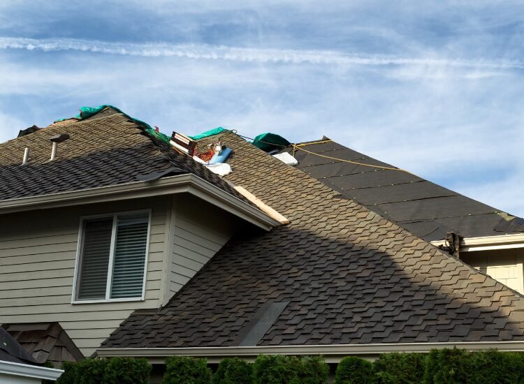 Roof Replacement Howell NJ - home getting a roof replacement with new shingles.