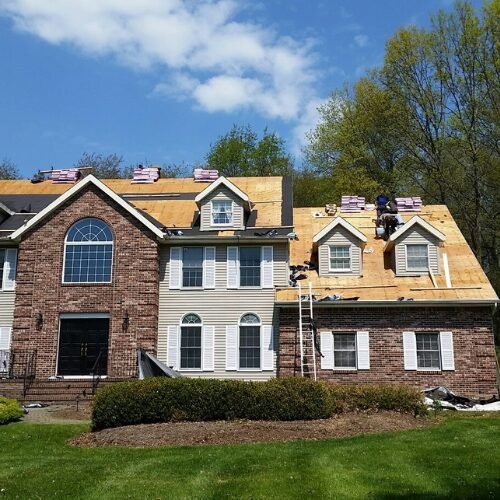 Roofing contractor Howell NJ - large home roof replacement.